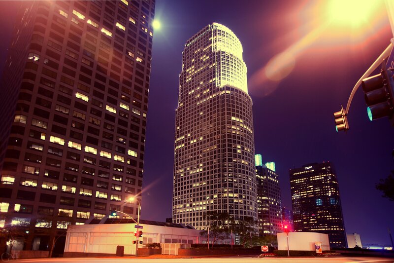 nighttime city skyline with skyscrapers