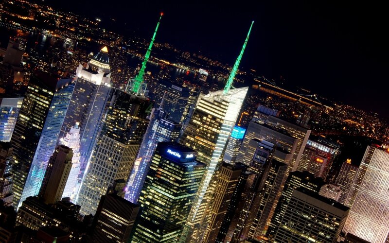 nighttime city skyline with skyscrapers