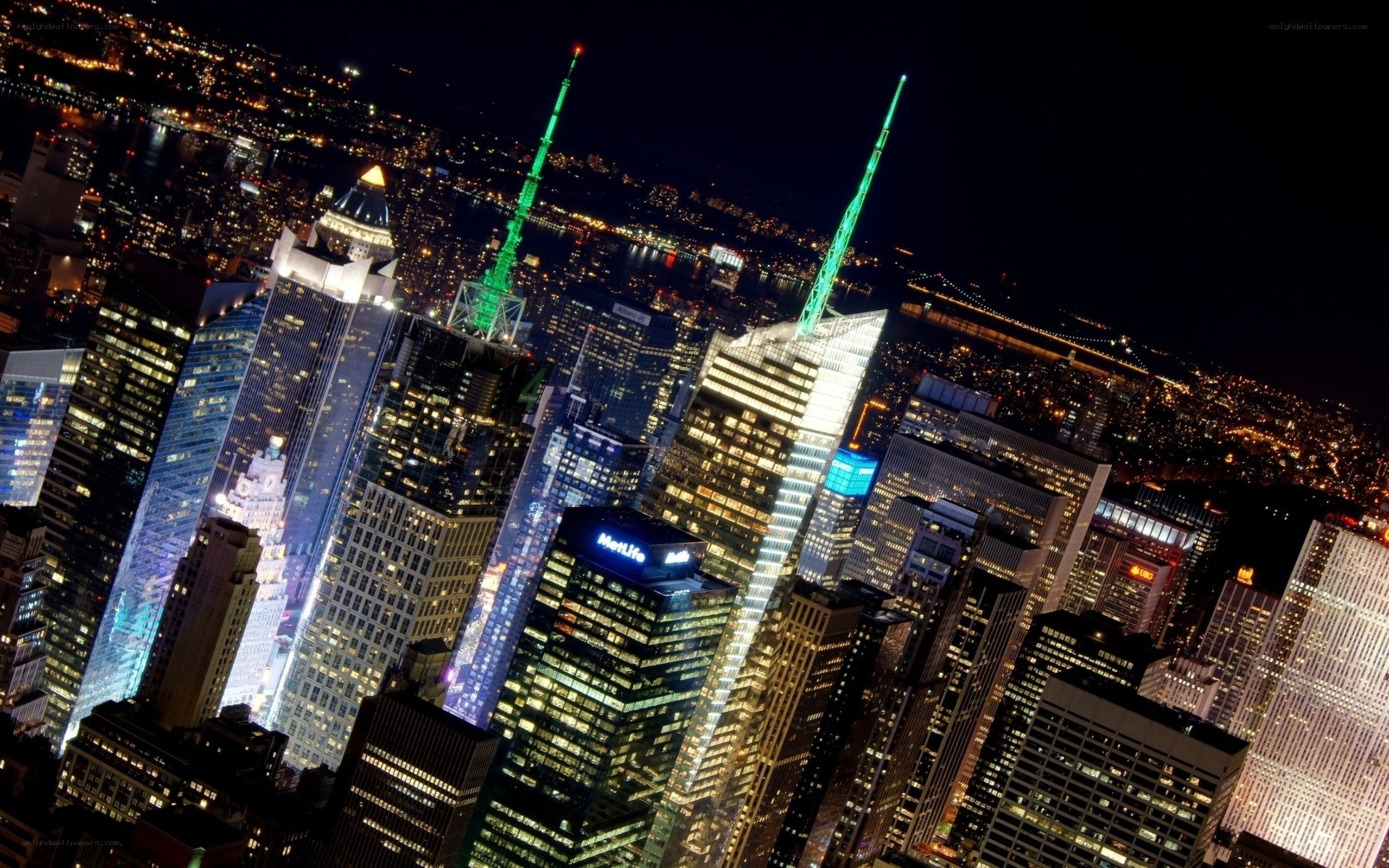 Nighttime city skyline with skyscrapers