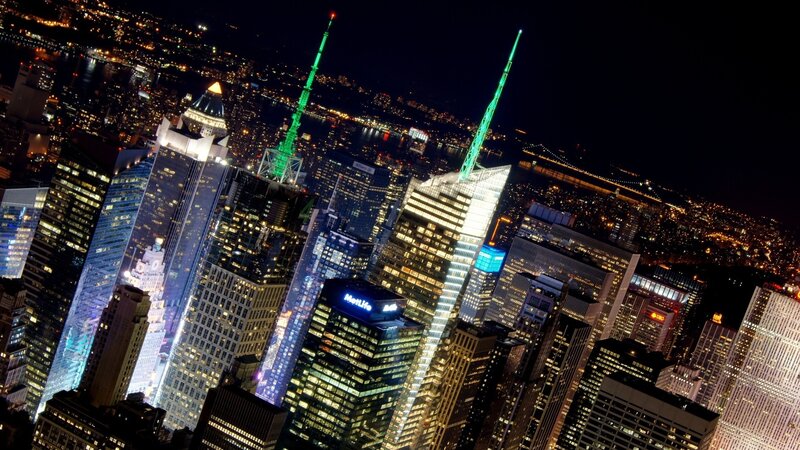 nighttime city skyline with skyscrapers