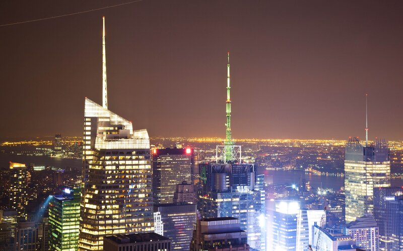 nighttime city skyline with skyscrapers