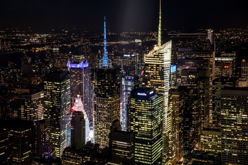 Nighttime city skyline with skyscrapers