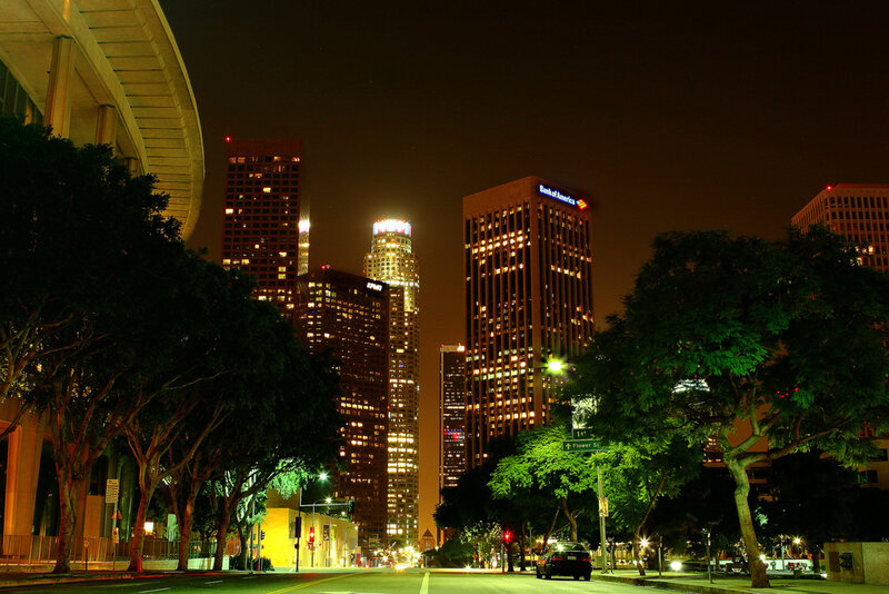 nighttime city skyline with skyscrapers