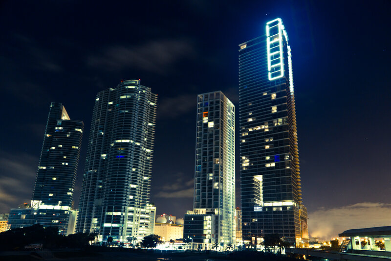 nighttime city skyline with skyscrapers