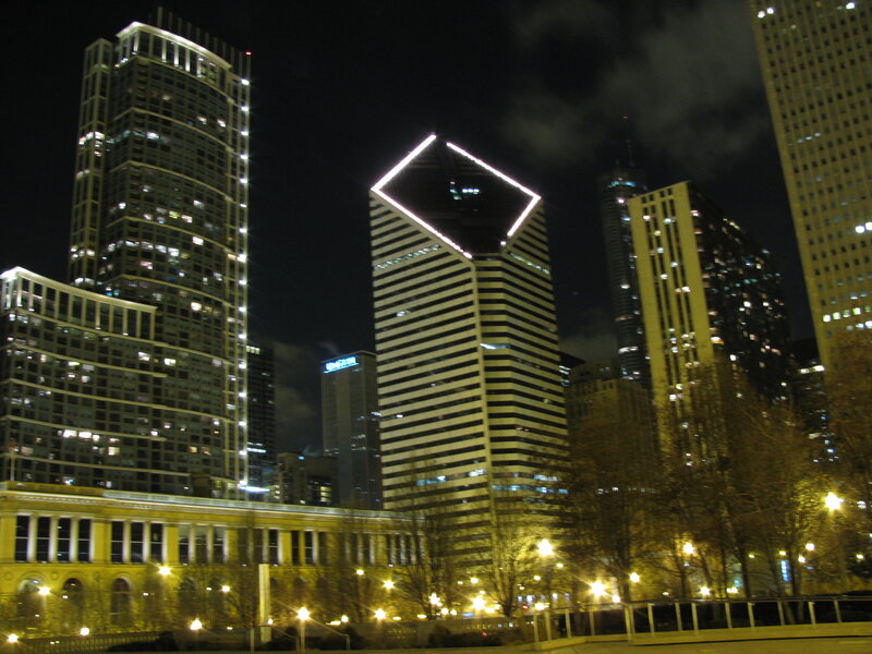 nighttime city skyline with skyscrapers