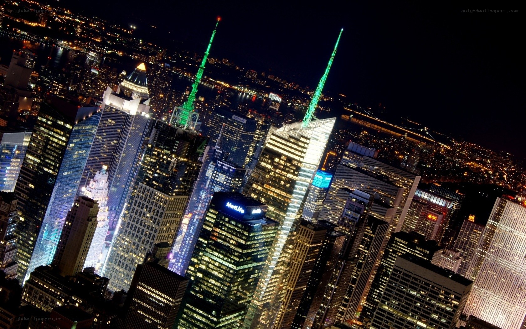 Nighttime city skyline with skyscrapers