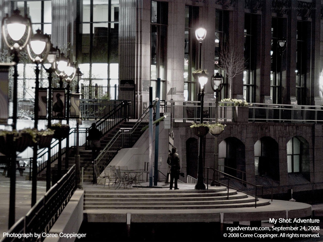 Nighttime city stairs and lampposts