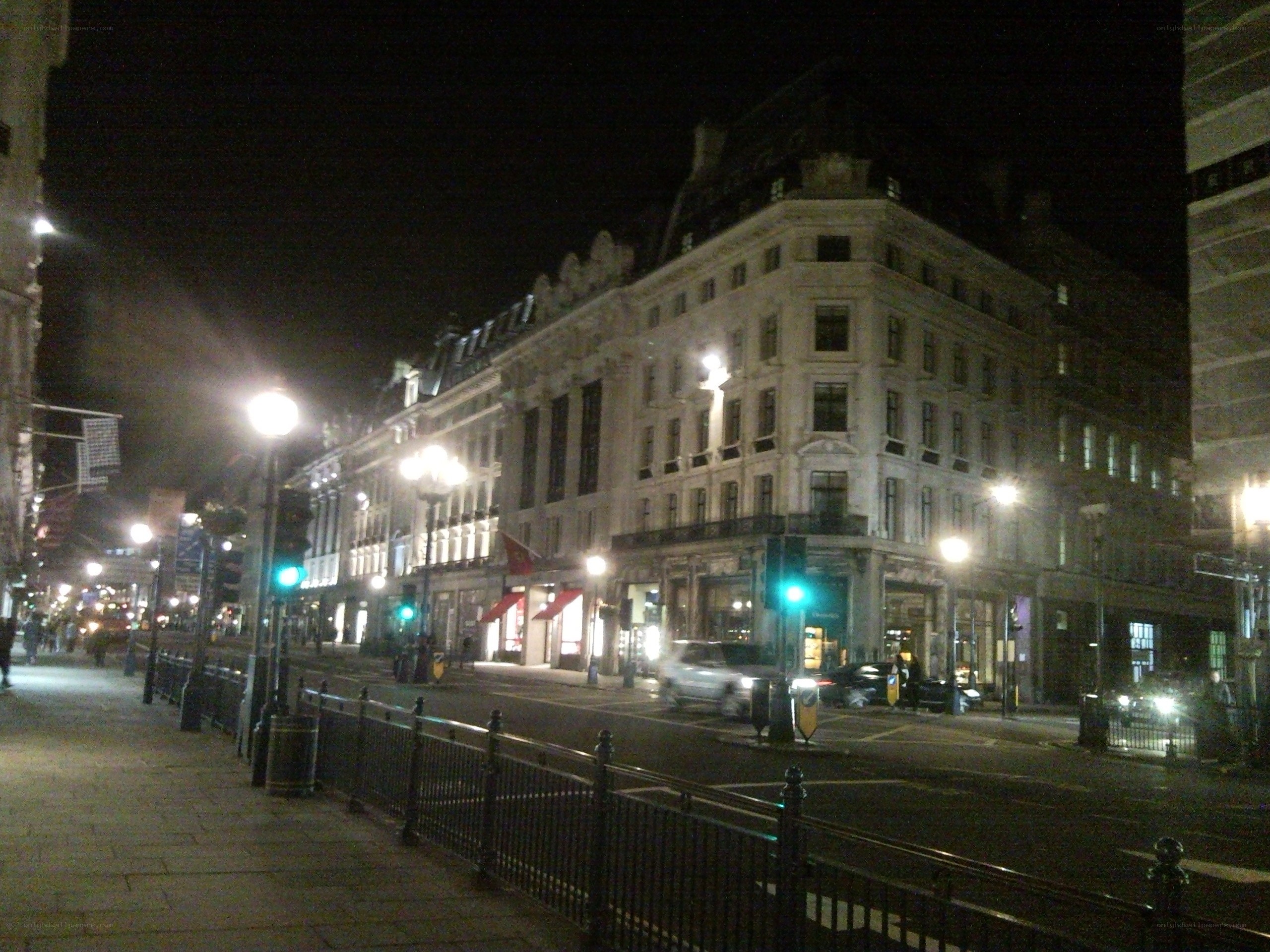 nighttime city street corner