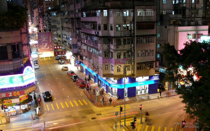 nighttime city street in hong kong