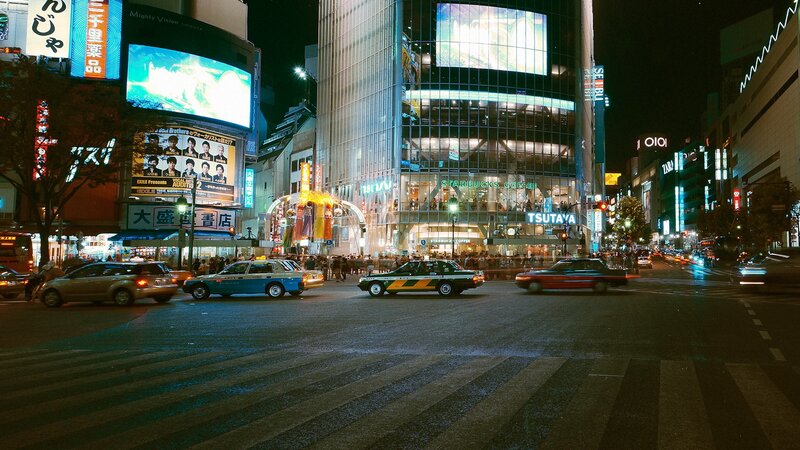 nighttime city street in tokyo