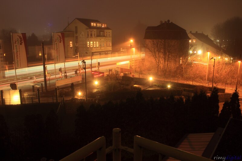 Nighttime City Street — Orange