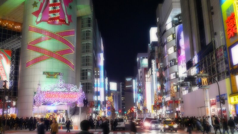 nighttime city street with neon lights