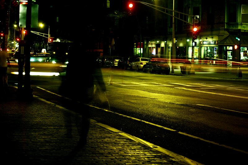 Nighttime city street with traffic