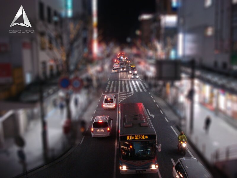 Nighttime city street with traffic