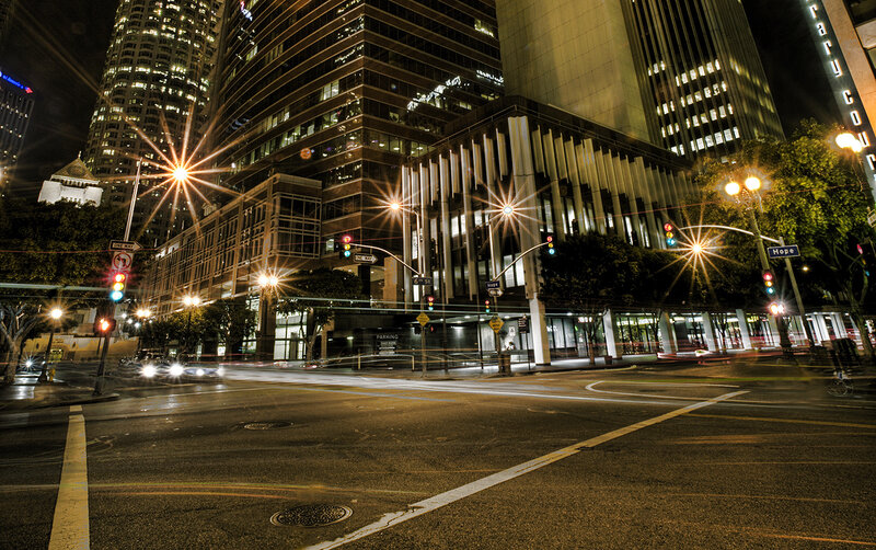 Nighttime city street with traffic
