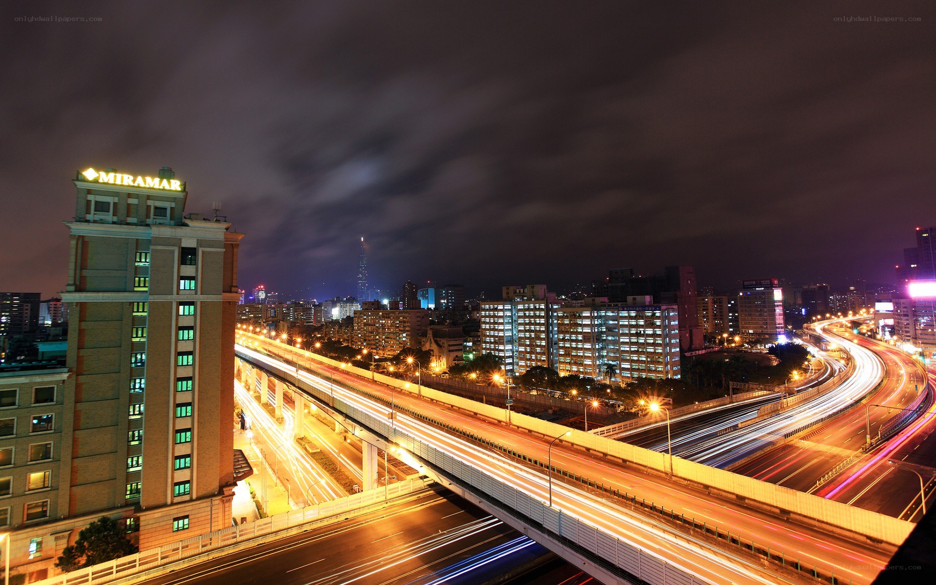 Nighttime city traffic and skyline