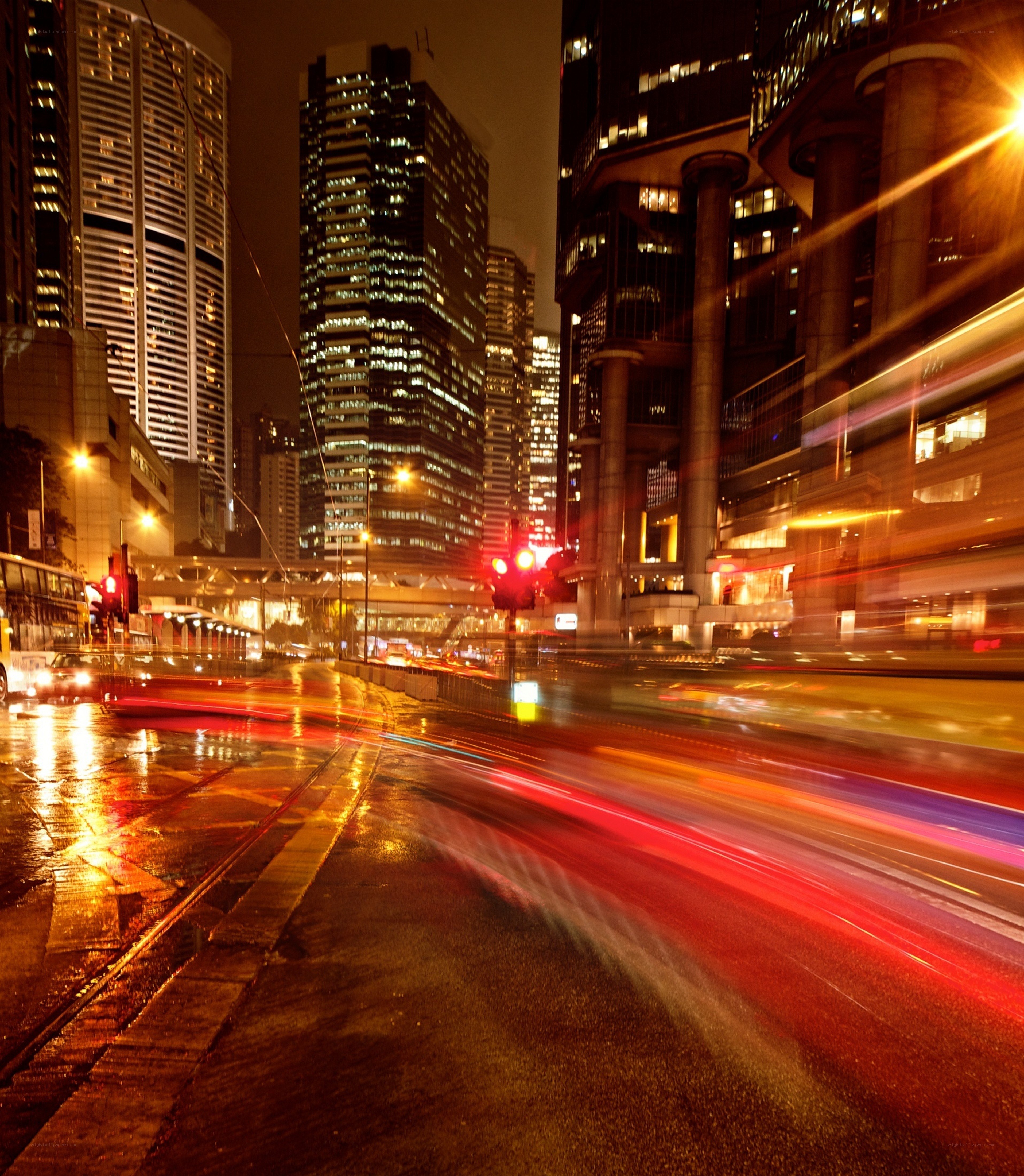 Nighttime city traffic with light trails
