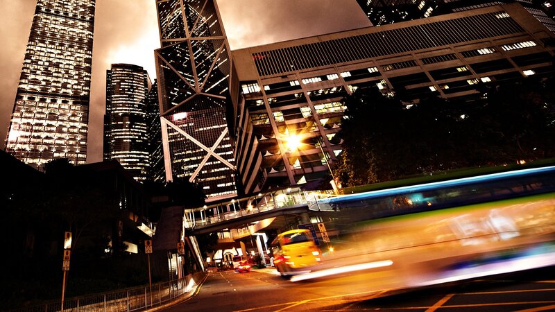 Nighttime city traffic with skyscrapers