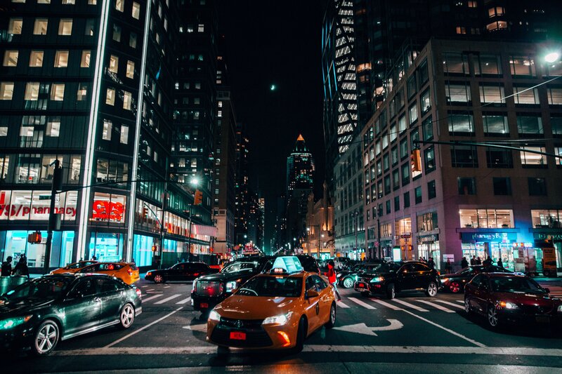 Nighttime city traffic with taxis