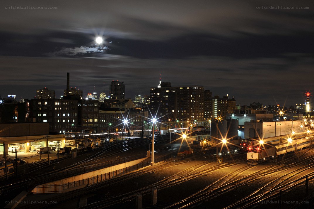 Nighttime city train yard