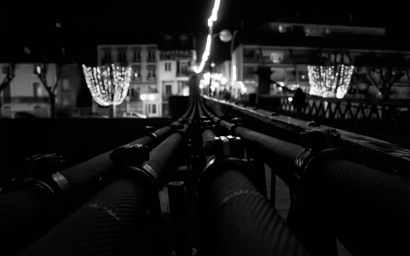 Nighttime city view from bridge