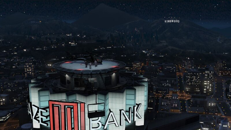 Nighttime city view with bank and helicopter