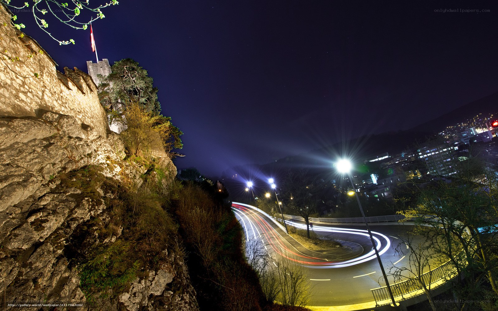 Nighttime city view with castle