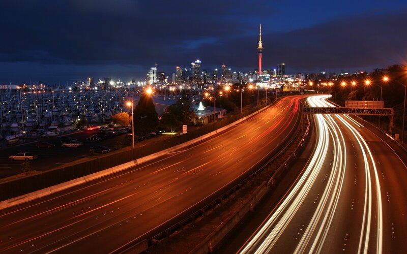 Nighttime city view with light trails