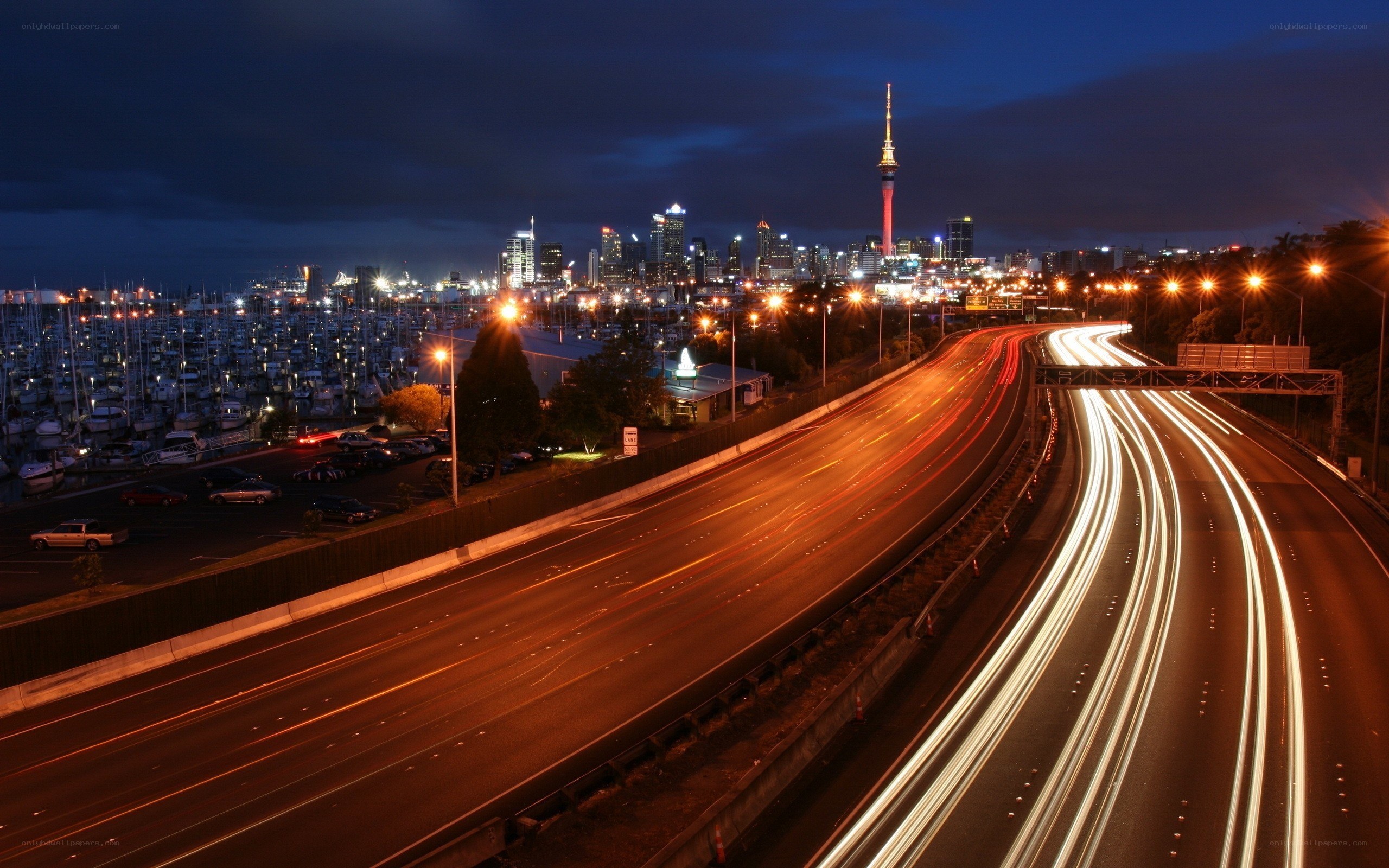 Nighttime city view with light trails