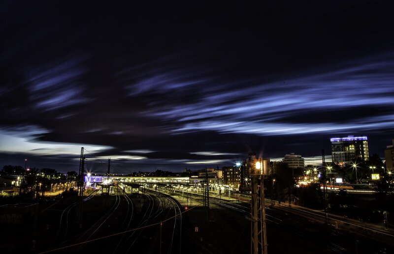Nighttime city with train tracks