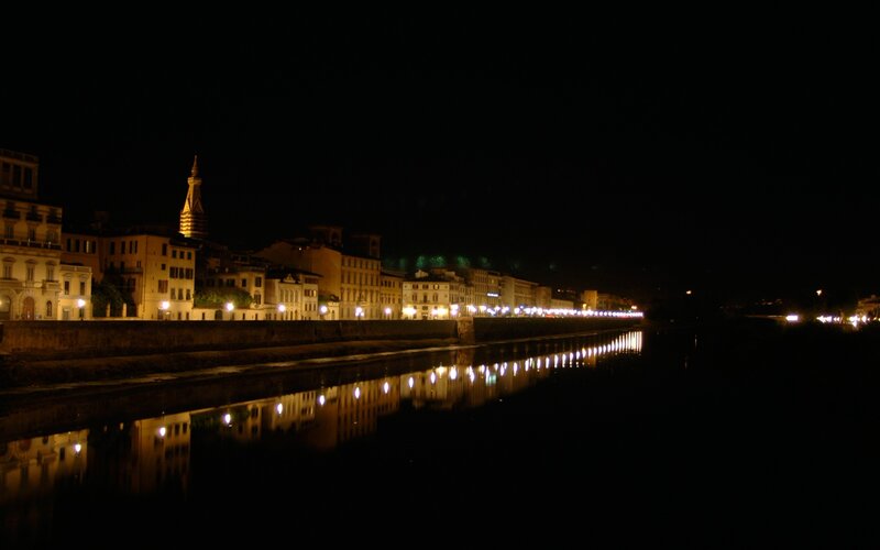 Nighttime Cityscape Along River