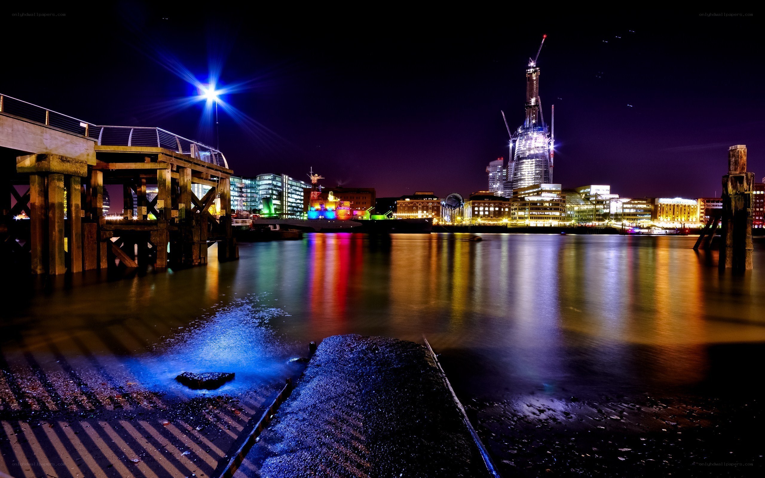 Nighttime cityscape by the river
