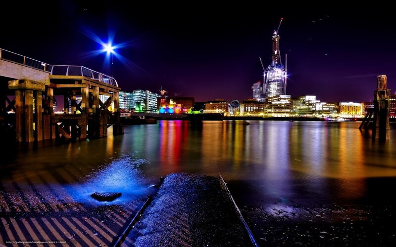 Nighttime cityscape by the river