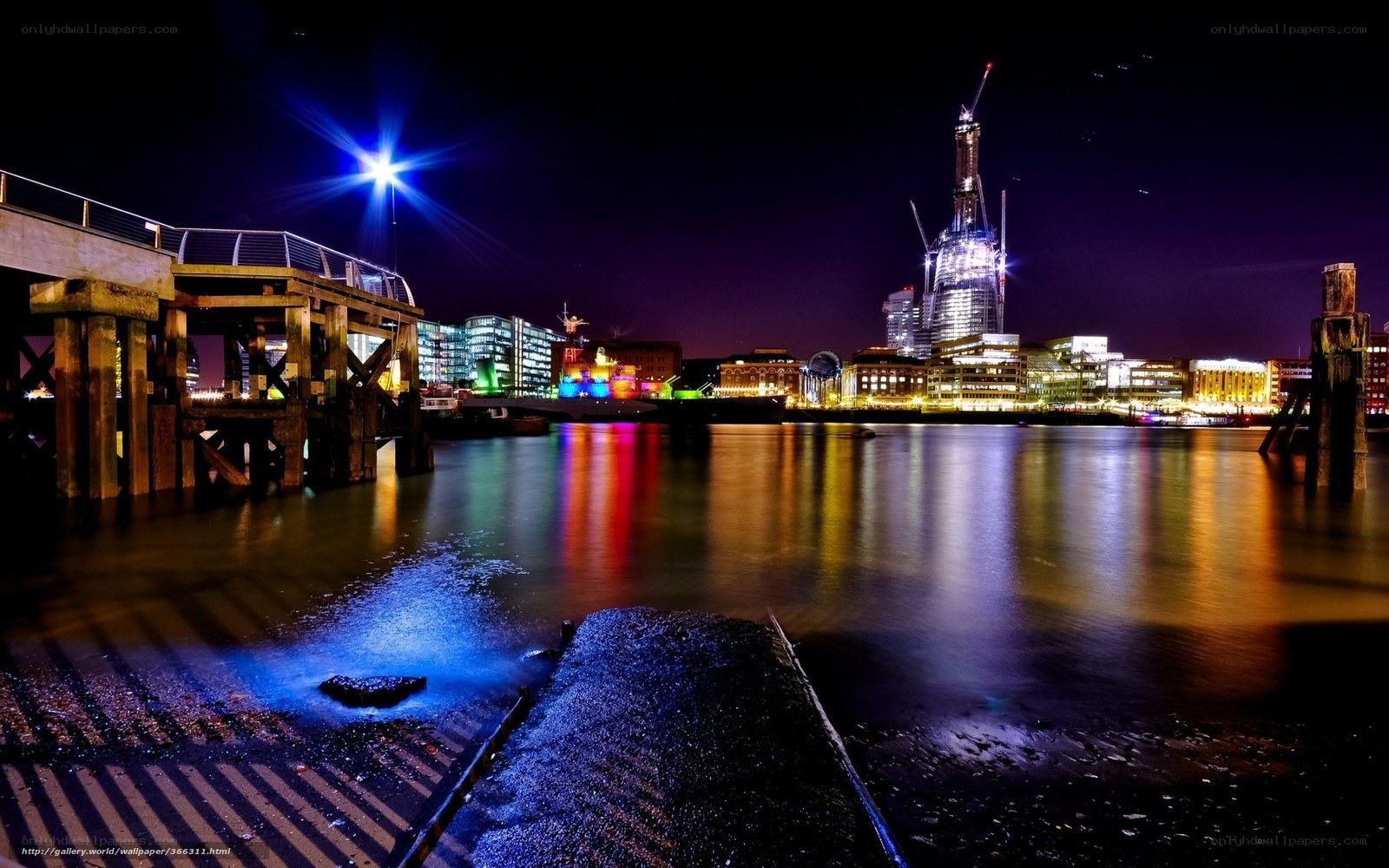 Nighttime cityscape by the river