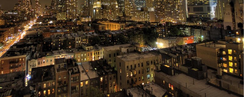 nighttime cityscape from rooftop