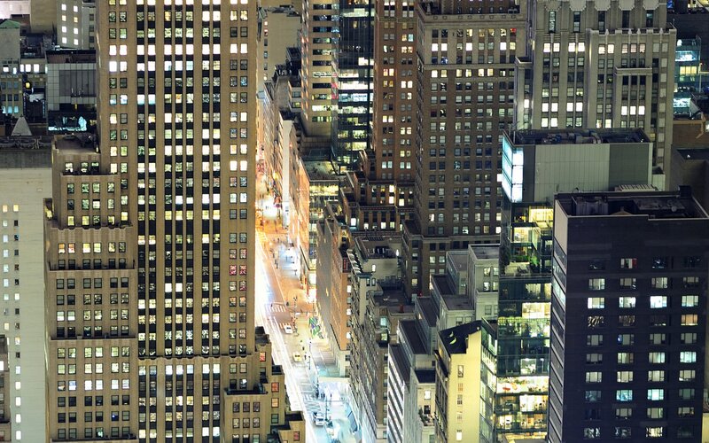 nighttime cityscape of skyscrapers