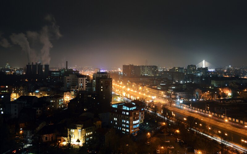 Nighttime Cityscape View — Black, Dark, Night, Photograph, Buildings, Smokestacks