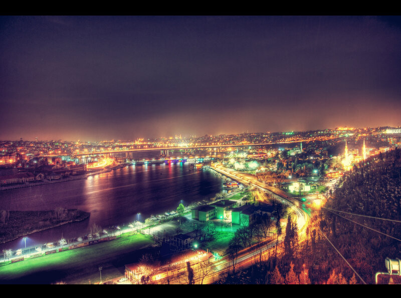 Nighttime Cityscape View — Purple