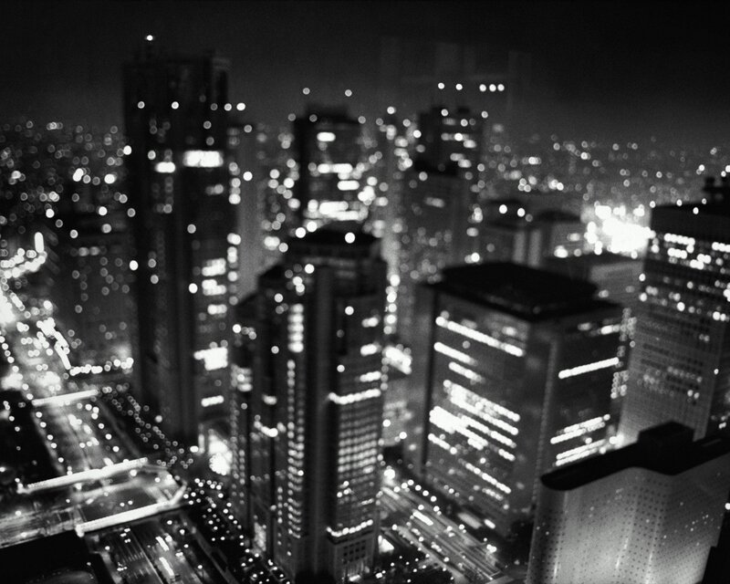 nighttime cityscape with bokeh lights