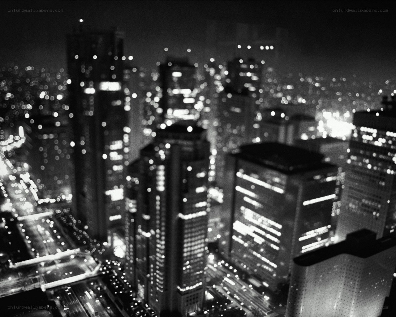 nighttime cityscape with bokeh lights