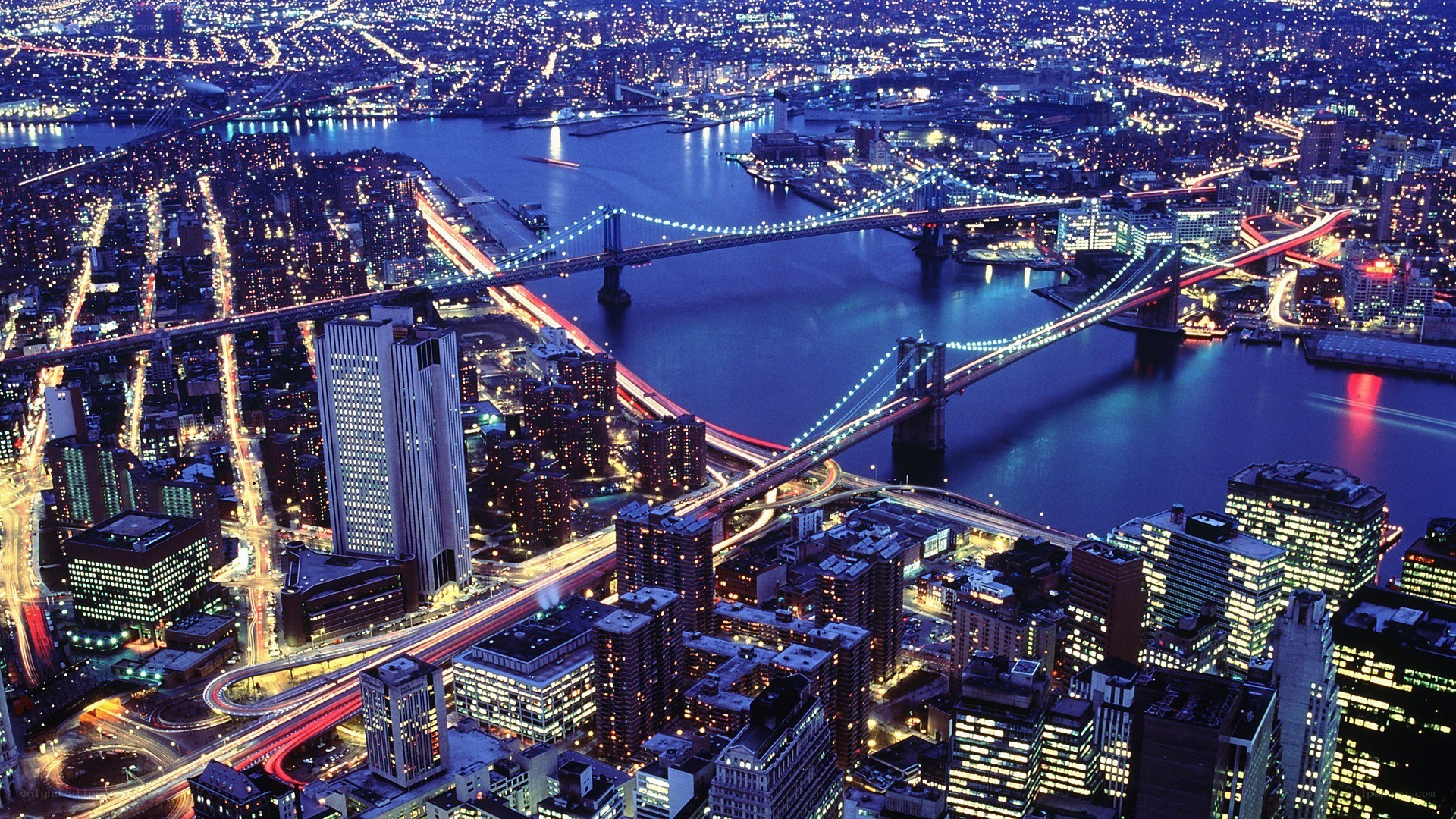 Nighttime cityscape with bridges
