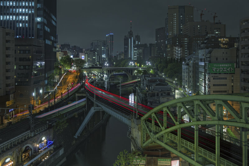 Nighttime Cityscape with Bridges — Green