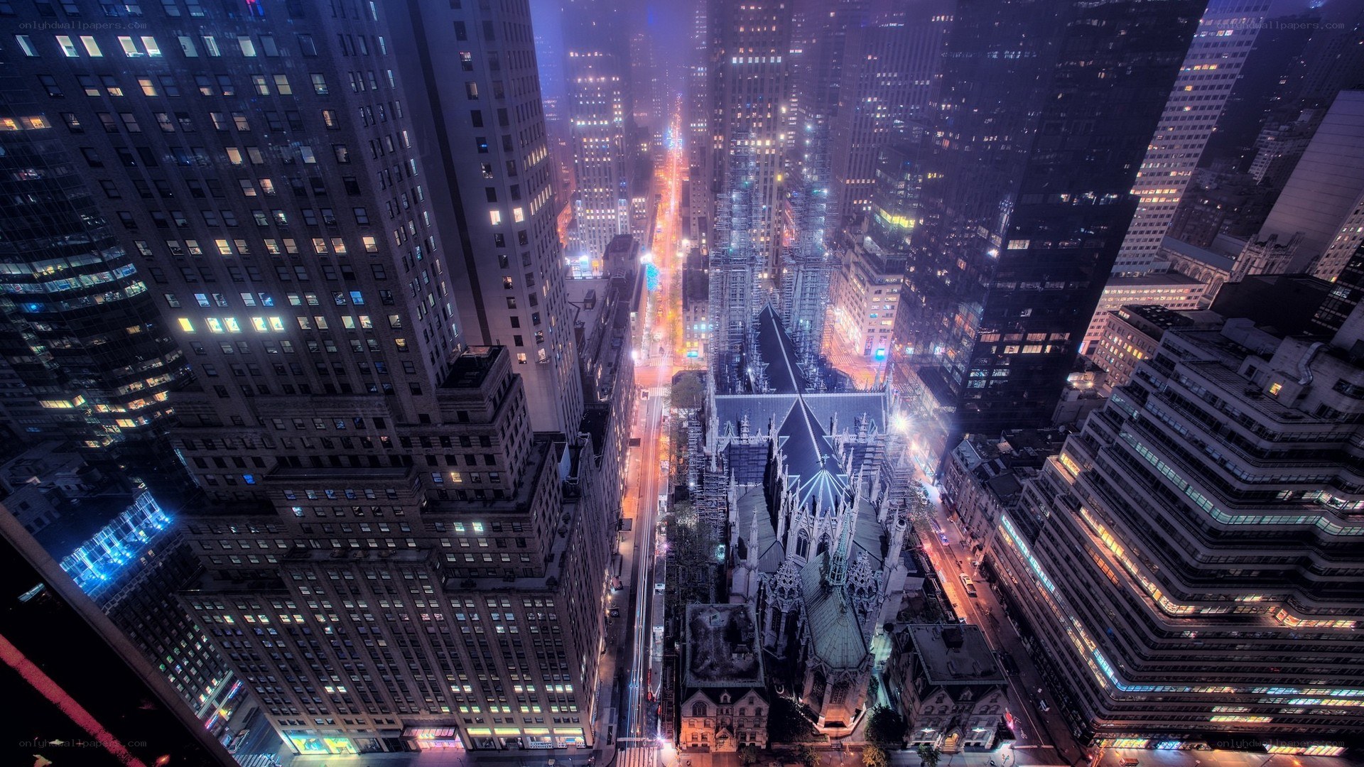 nighttime cityscape with cathedral