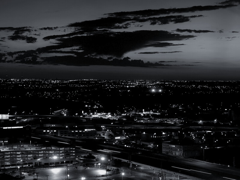 nighttime cityscape with clouds