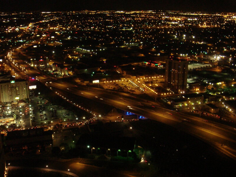 nighttime cityscape with highways