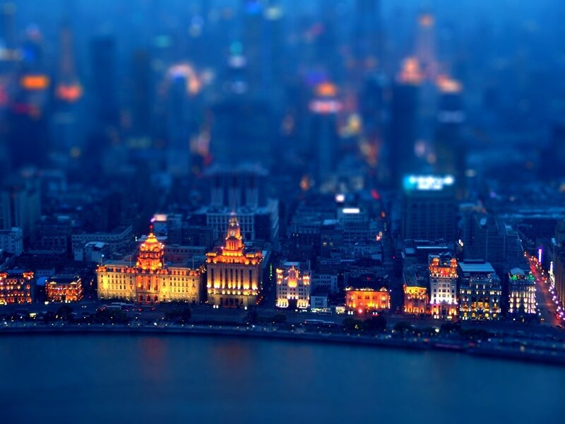 nighttime cityscape with illuminated buildings