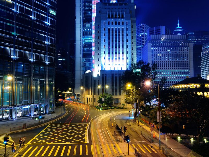 Nighttime cityscape with illuminated buildings
