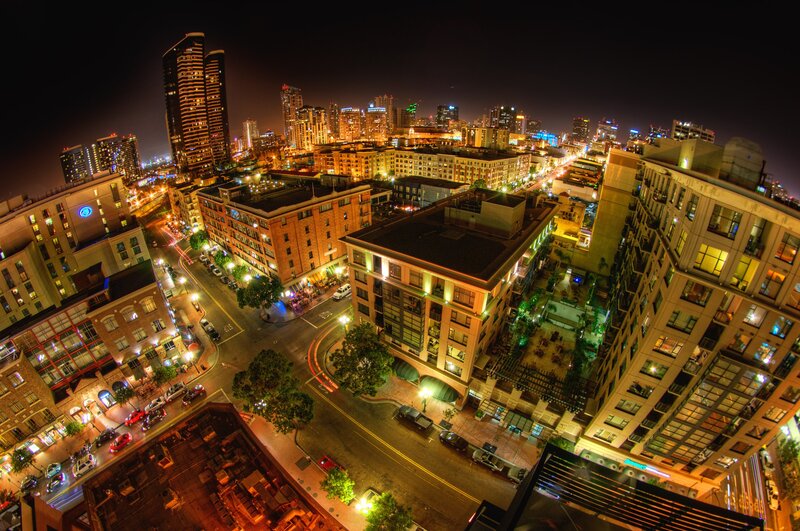 nighttime cityscape with illuminated buildings
