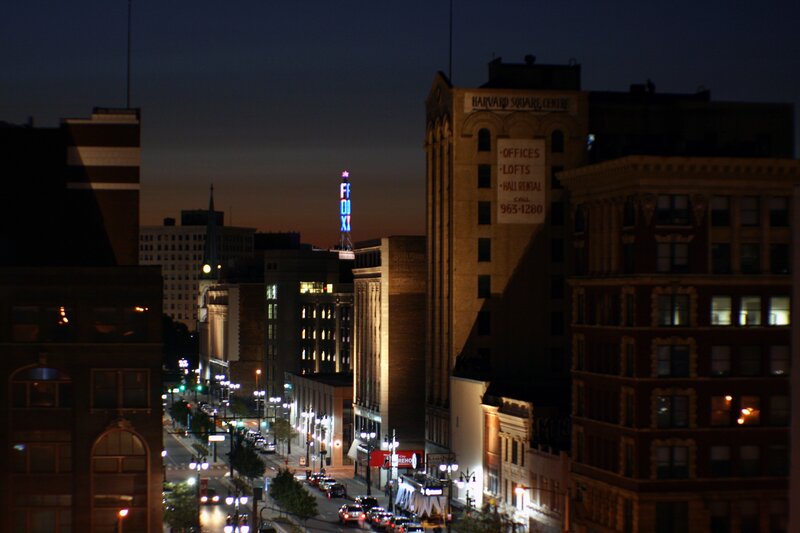 nighttime cityscape with illuminated buildings