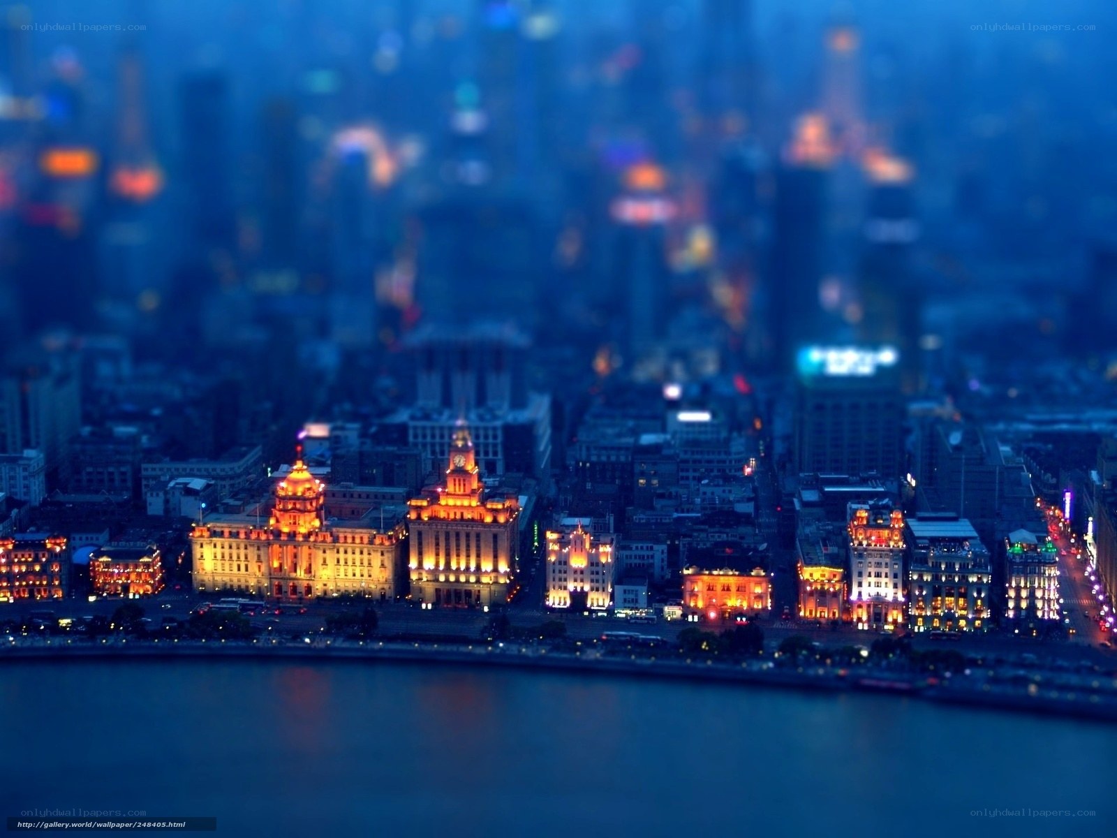 nighttime cityscape with illuminated buildings